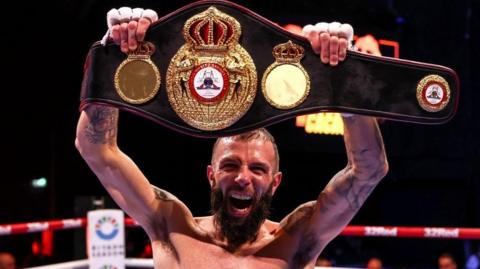 Anthony Cacace with the WBA super-featherweight title 