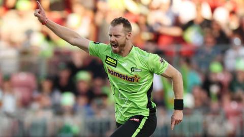 Nathan McAndrew celebrates taking a wicket for Sydney Thunder
