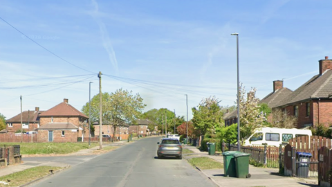 A quiet housing estate on a sunny day.