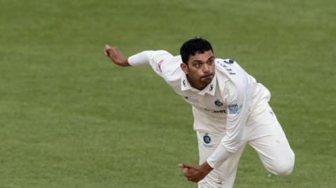 Nathan Fernandes of Middlesex in delivery stride during the Vitality County Championship division two match between Northamptonshire and Middlesex at The County Ground