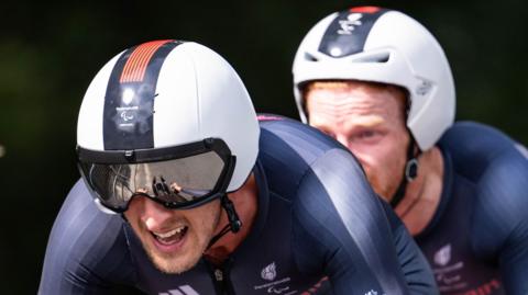 Chris Latham and Stephen Bate on a bike