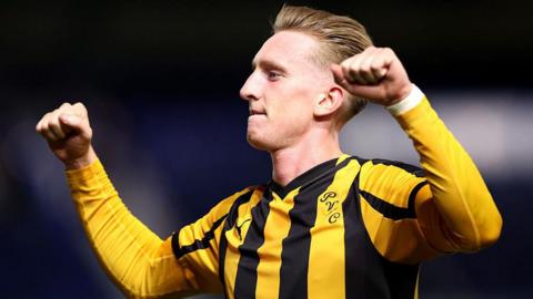 Port Vale's Ronan Curtis celebrates with a double fist pump 
