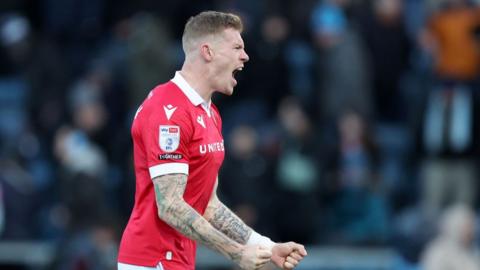 Wrexham's James McClean celebrates