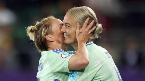 Sophie Ingle is hugged by Jess Fishlock