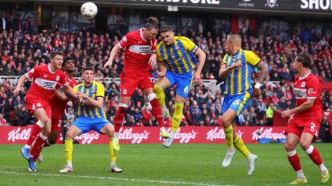 Southampton and Middlesbrough players attempt to win a header