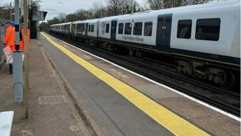 A South Western Railway train in Walton station