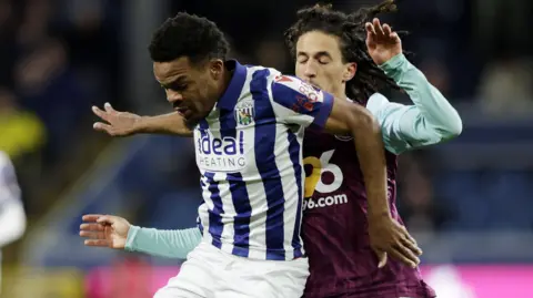 West Bromwich Albion's Grady Diangana and Burnley's Hannibal Mejbri compete for the ball