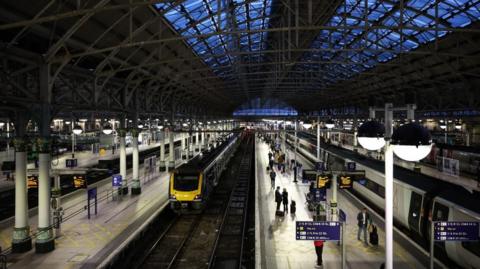 A large busy railway station from above