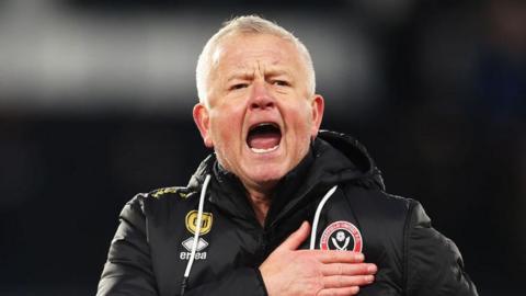 Chris Wilder taps Sheffield United badge and roars