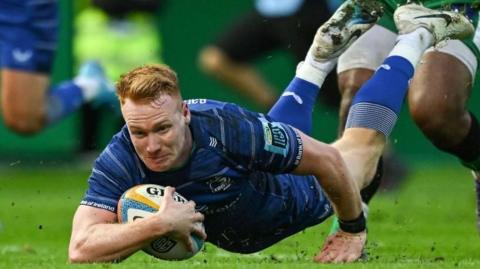 Leinster's Ciaran Frawley scores a try