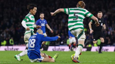 Celtic defender Liam Scales was booked pulling down Rangers winger Vaclav Cerny