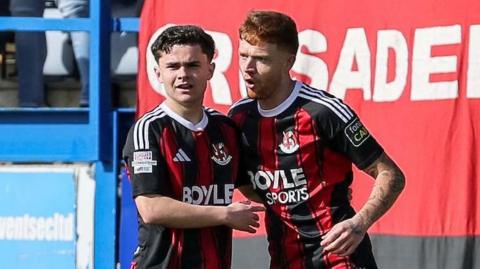 Fraser Bryden is congratulated