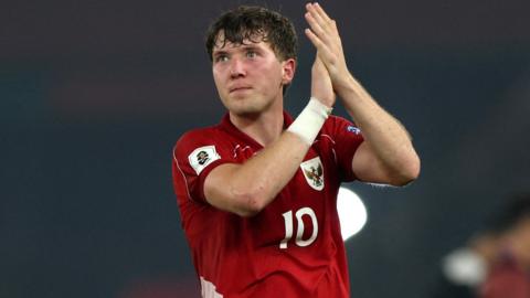 Ole Romeny claps the fans after scoring the only goal of the game in Indonesia's 1-0 win over China in a World Cup qualifier