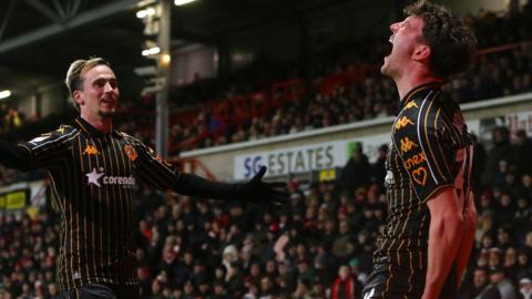 Hull City celebrate scoring at Wrexham