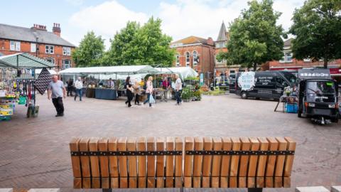 General view of the new Heanor Market Place with shoppers milling about