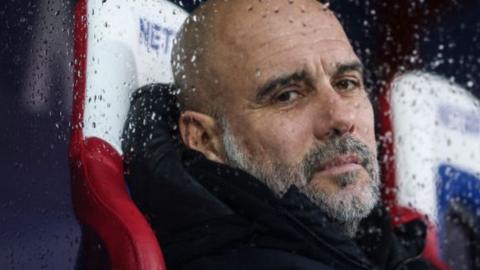 Coach Pep Guardiola at a Manchester City match