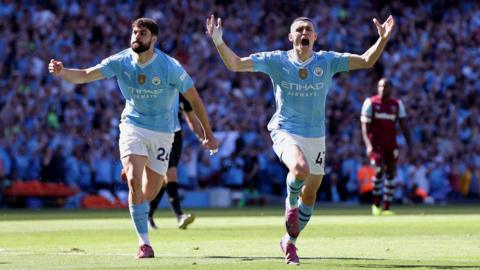 Phil Foden celebrates scoring for Manchester City
