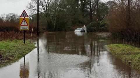 Car stuck in a flood