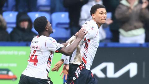 Mason Burstow of Bolton Wanderers celebrates scoring his side's second goal