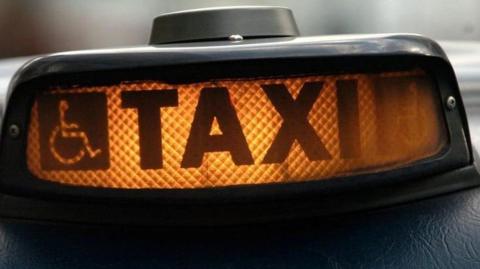 Taxi sign