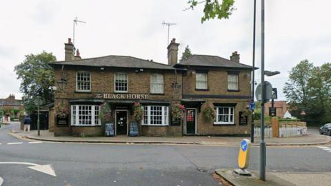 outside of the black horse pub