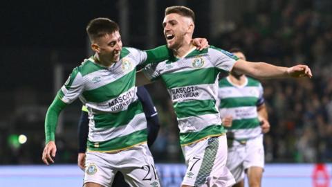 Dylan Watts of Shamrock Rovers, right, celebrates with team-mate Darragh Burns after scoring a goal