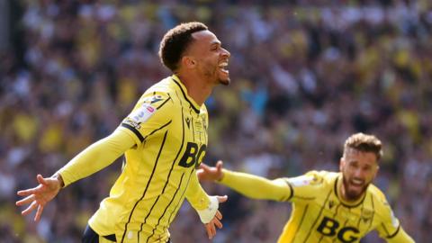 Josh Murphy celebrates scoring for Oxford against Bolton