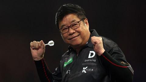 Paul Lim celebrating