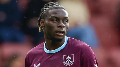 Lesley Ugochukwu in action for Burnley in April during their unsuccessful Premier League relegation fight