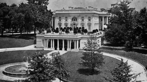 President Theodore Roosevelt's newly constructed White House wing and outdoor fountain