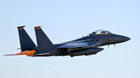 An F-15E Strike Eagle takes off for a combat flight