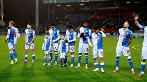 Blackburn players line up before the 1-0 loss at home to QPR