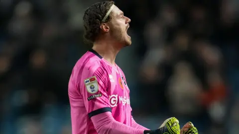 Lukas Jensen celebrates Millwall's win against Burnley