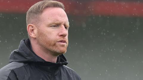 Brackley boss Gavin Cowan looks on 