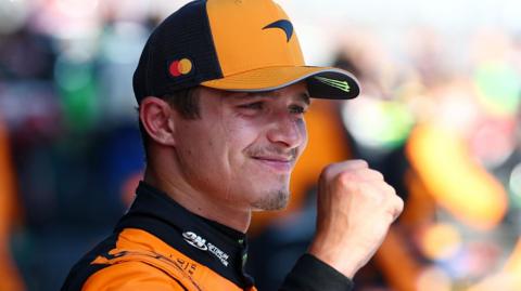 Lando Norris clenches his right fist in celebration after winning the Austrian Grand Prix