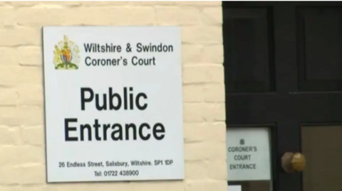 A sign which says 'public entrance' and 'Wiltshire and Swindon Coroner's Court'