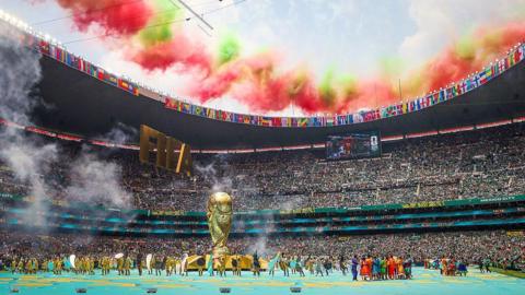 a packed Azteca stadium with fireworks going ofg