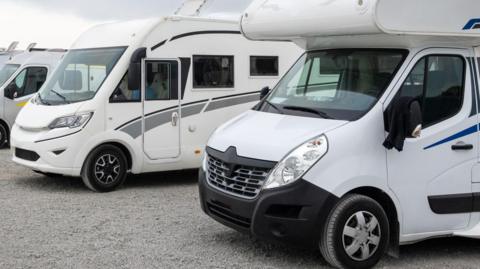 line of parked motorhomes