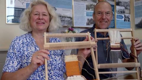 Weavers with their London Overground roundel