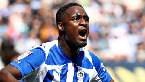 Christian Saydee scored one of Wigan's goals