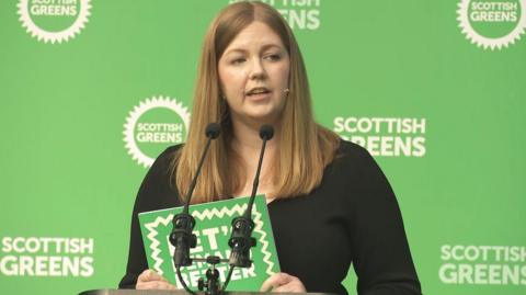 Gillian Mackay holds her party's manifesto at the launch