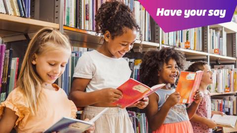 Children reading in a library.