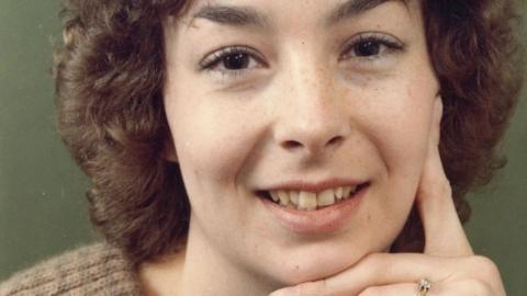 A vintage 1980s photo of a woman