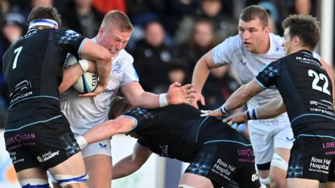 Leinster's Paddy McCarthy of Leinster in action against Glasgow Warriors' Rory Darge and Johnny Matthews 