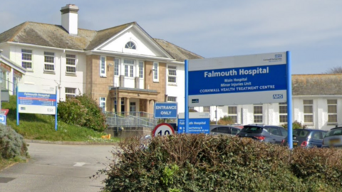 Close up of Falmouth Community Hospital sign and building