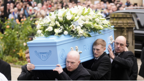 Hatton coffin arrives