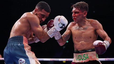 Galal Yafai is hit by a punch from a bloodied Francisco Rodriguez Jr
