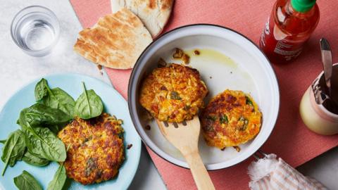 Leftover risotto fritters, with toasted pitta and spinach