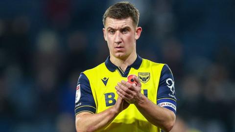 Cameron Brannagan applauds the fans 