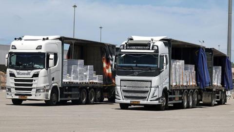 Aid trucks near Kerem Shalom crossing. 